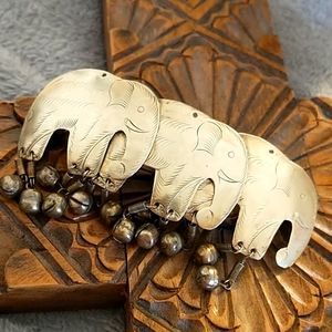 Barrette with three elephants and hanging balls